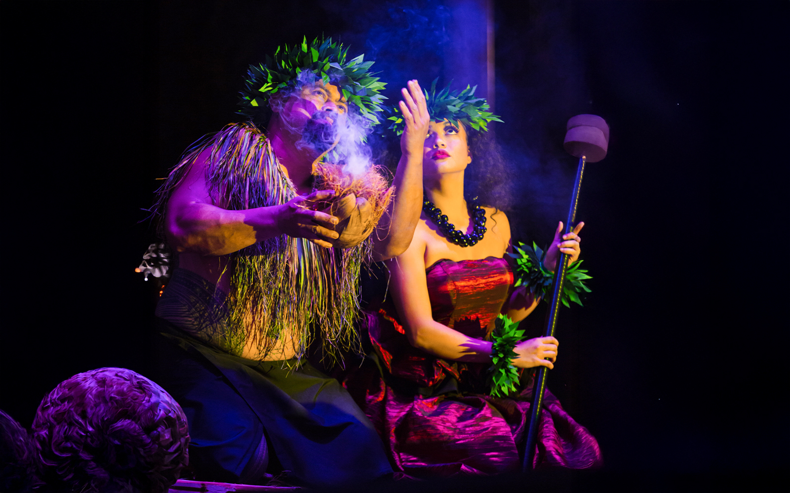Performers at Moana Luau in Hawaii showcasing traditional Hawaiian dance and rituals.