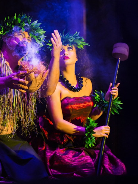 Performers at Moana Luau in Hawaii showcasing traditional Hawaiian dance and rituals.