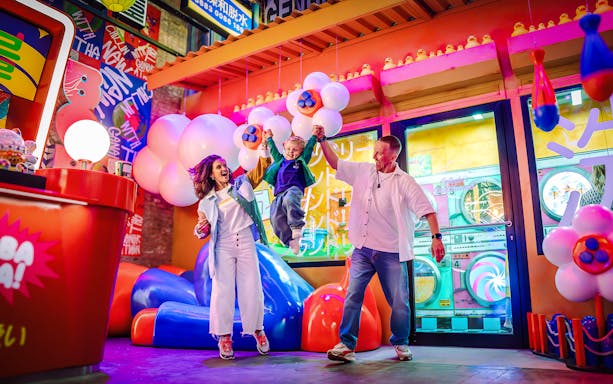 Visitors enjoying interactive digital displays at House of Hype.