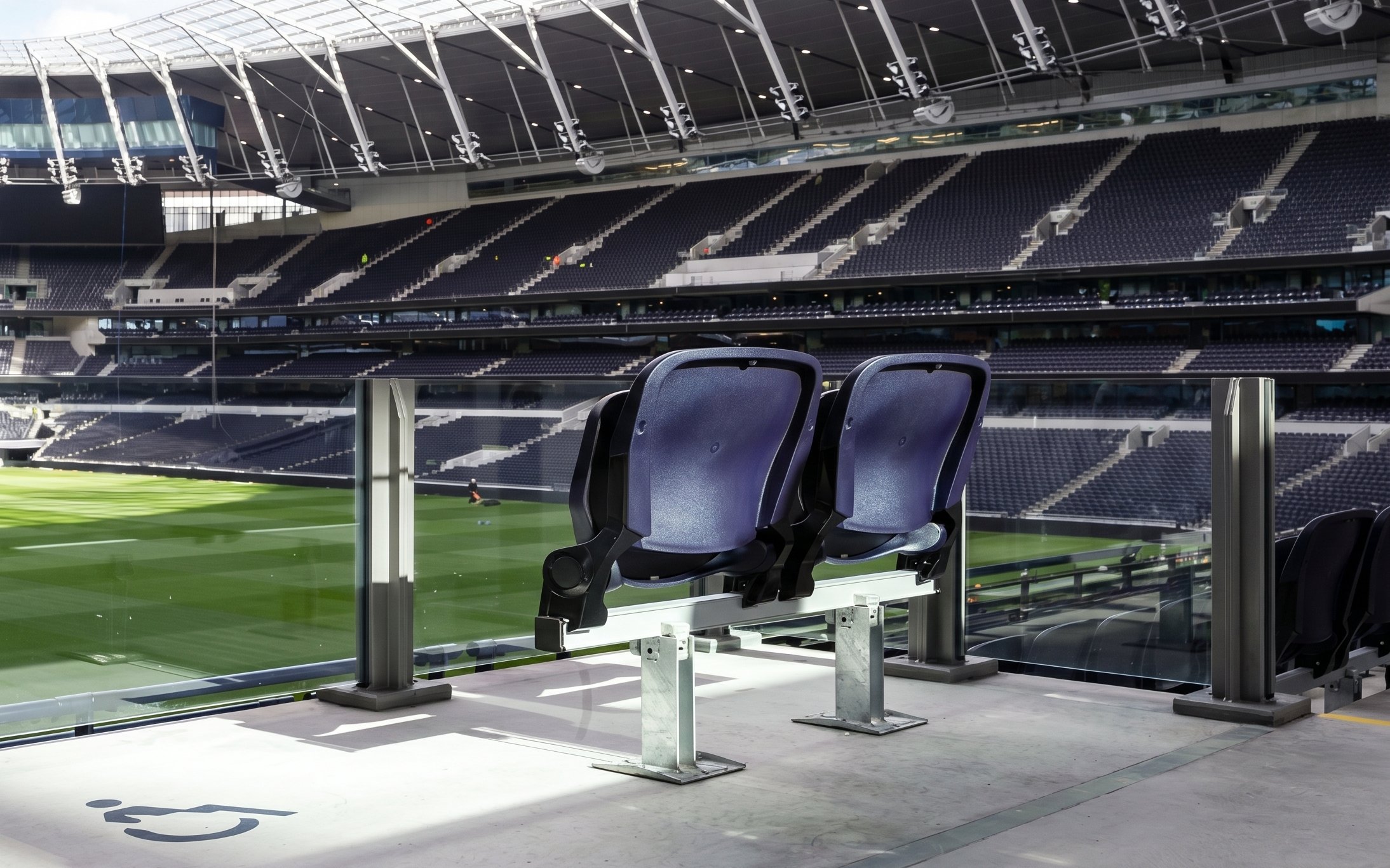 Accessible seating overlooking the pitch at Tottenham Hotspur Stadium.