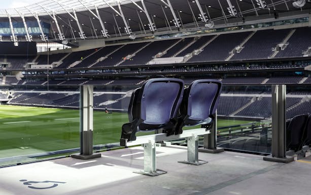 Accessible seating overlooking the pitch at Tottenham Hotspur Stadium.