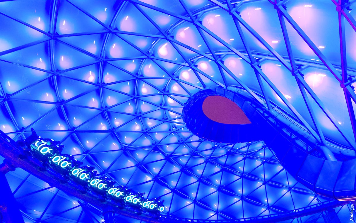 TRON Lightcycle Power Run illuminated canopy with futuristic design.