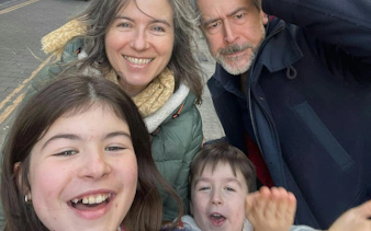 Family enjoying Brighton Secret Society Mystery self-guided city exploration game.