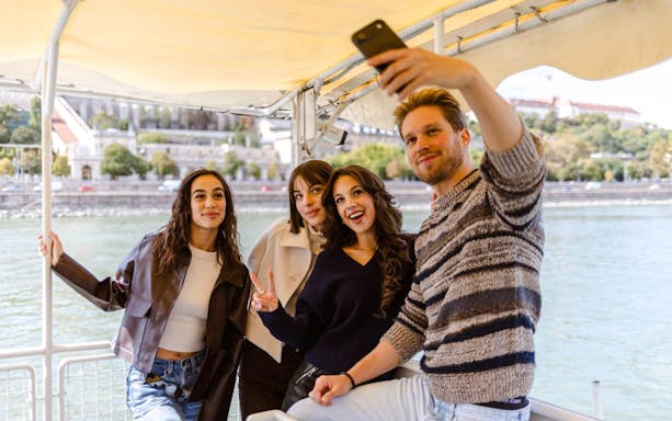 Guests taking a selfie on the Budapest Highlights River Cruise on the Danube.