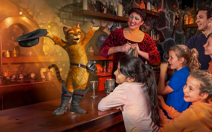 Puss in Boots entertaining children at Shrek’s Adventure! London.