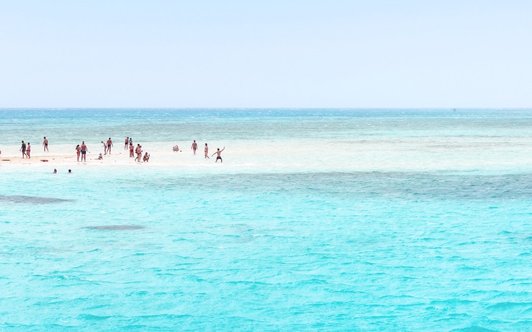 Visitors enjoying White Island beach at Ras Mohamed National Park, Sharm El-Sheikh.
