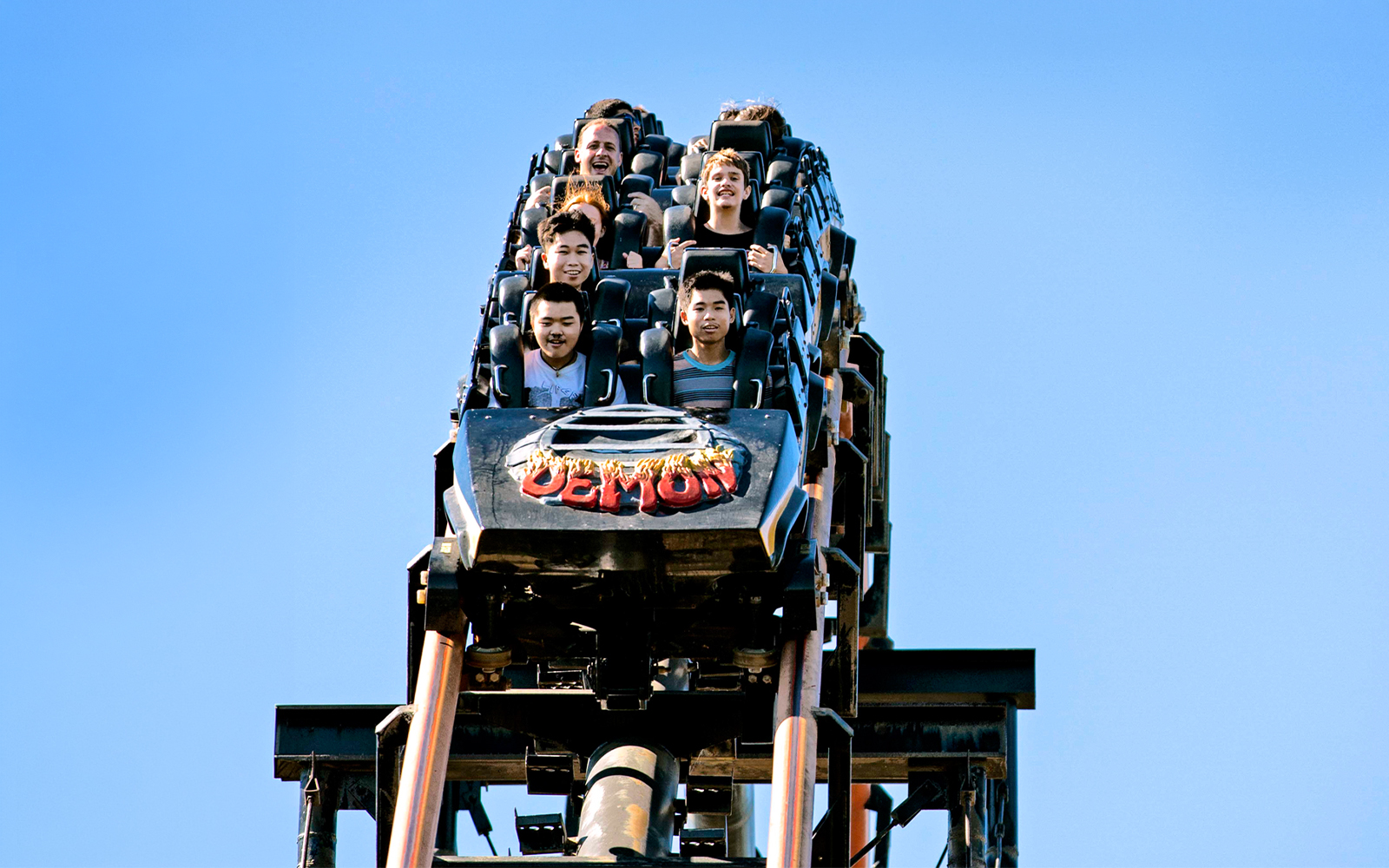 Riders on the Demon rollercoaster at California's Great America, Six Flags.