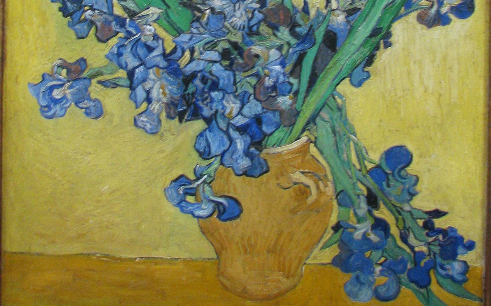 Irises in a vase, oil painting by Vincent van Gogh.