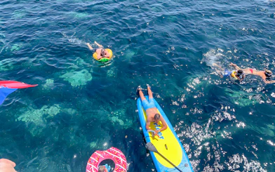 People enjoying water activities near Split, Croatia, during a Hvar and islands cruise.