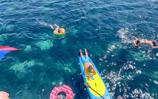 People enjoying water activities near Split, Croatia, during a Hvar and islands cruise.
