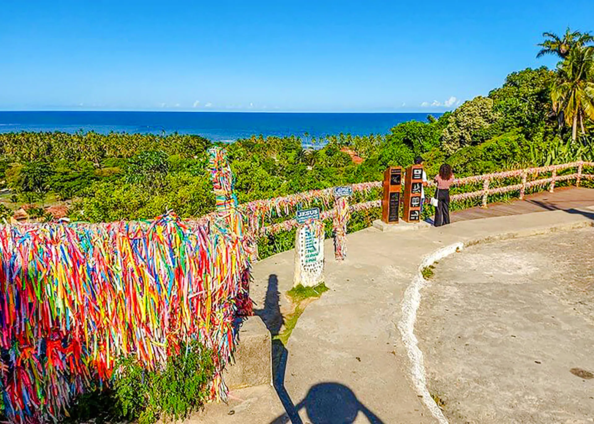 Colorful ribbons on a viewpoint overlooking the ocean in Arraial d'Ajuda, Porto Seguro.