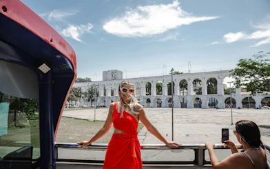 Hop-on hop-off bus tour in Rio de Janeiro with view of Arcos da Lapa.