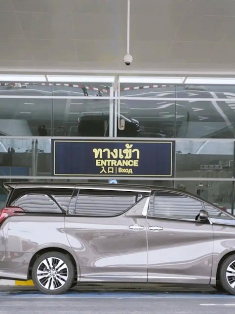 VIP fast-track service vehicle at Donmuang Airport entrance.