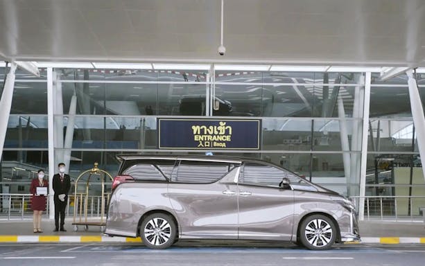 VIP fast-track service vehicle at Donmuang Airport entrance.