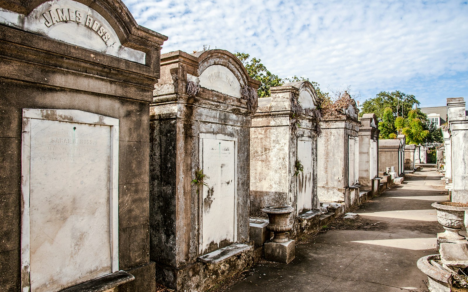 Tombs in Lafayette Cemetery No. 1, New Orleans, USA, with a clear sky above.