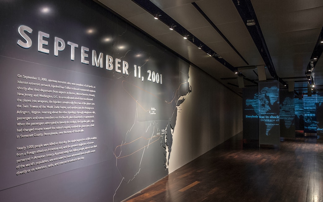 9/11 Museum exhibit with September 11, 2001 text and map display.