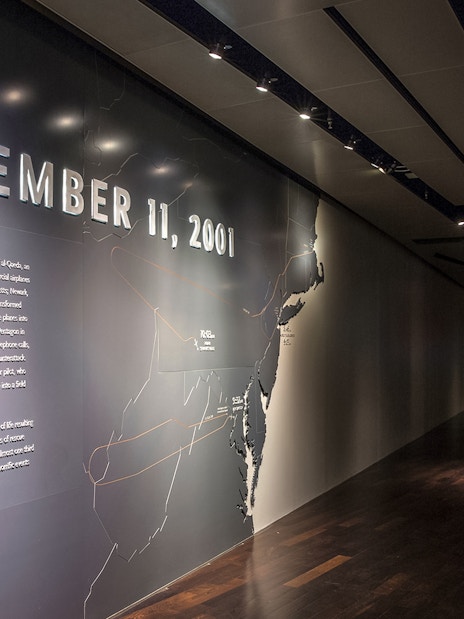 #9/11 Museum exhibit with September 11, 2001 text and map display.
