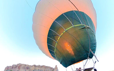 Hot air balloon ascending over Ihlara Valley, Cappadocia.
