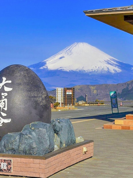 Owakudani black egg monument with Mount Fuji in the background, Hakone, Japan.