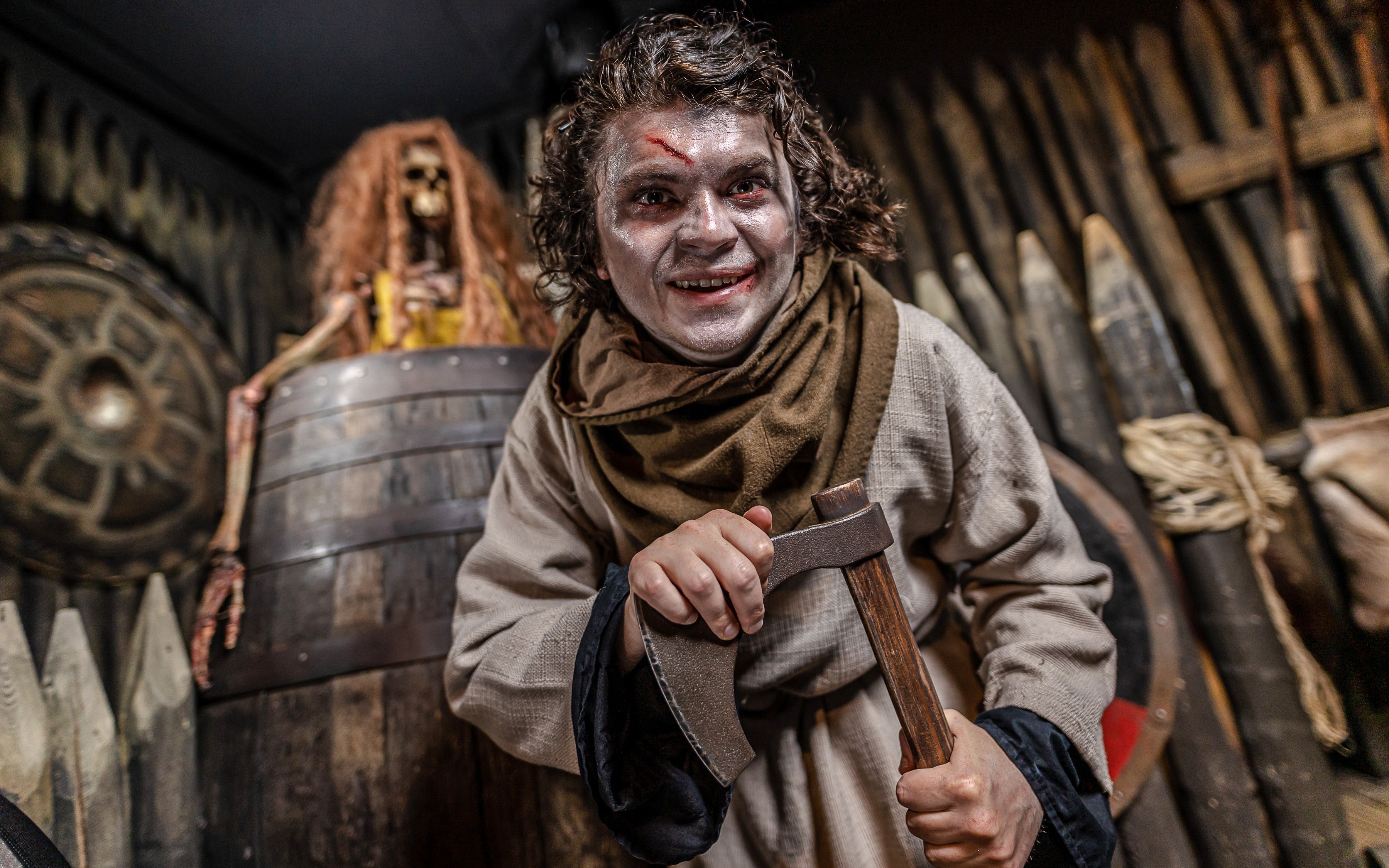 Viking actor with axe at York Dungeon's Vengeance of the Vikings exhibit.