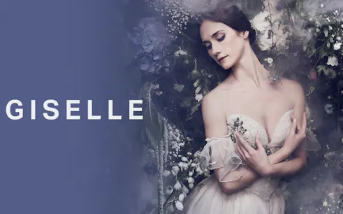 Ballet dancer in a floral setting for Giselle performance.