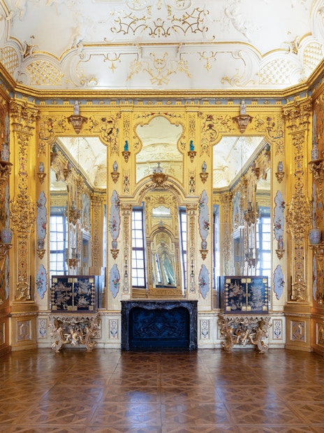 Ornate gold room interior at Upper Belvedere Palace, Vienna.