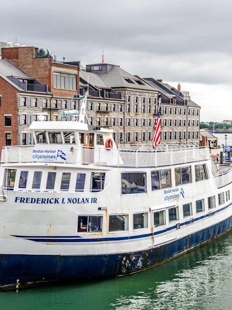 Frederick L Nolan Jr boat docked at Boston Harbor with historic buildings in the background