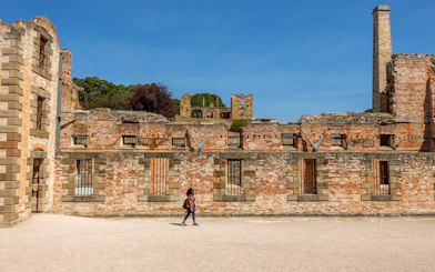 Port Arthur historic site ruins under blue sky, Tasmania.