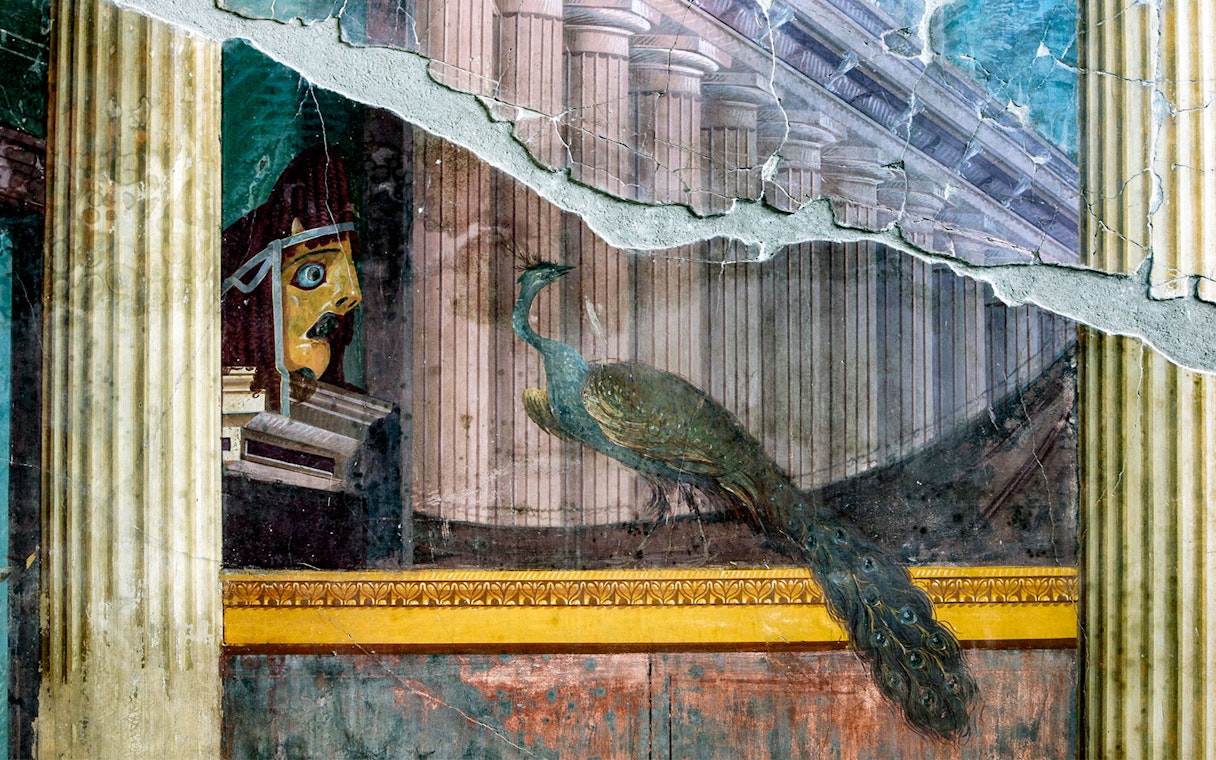 Fresco of a peacock and theatrical mask at Oplontis, Torre Annunziata.