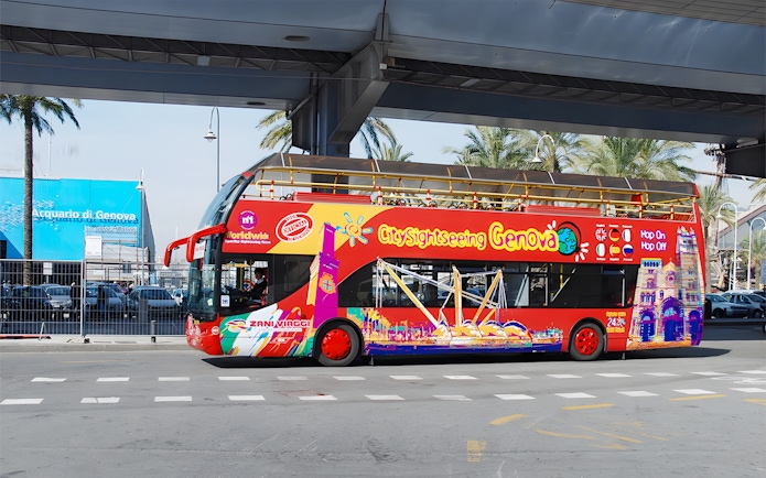 Open-top sightseeing bus in Genoa, Italy, near Acquario di Genova.