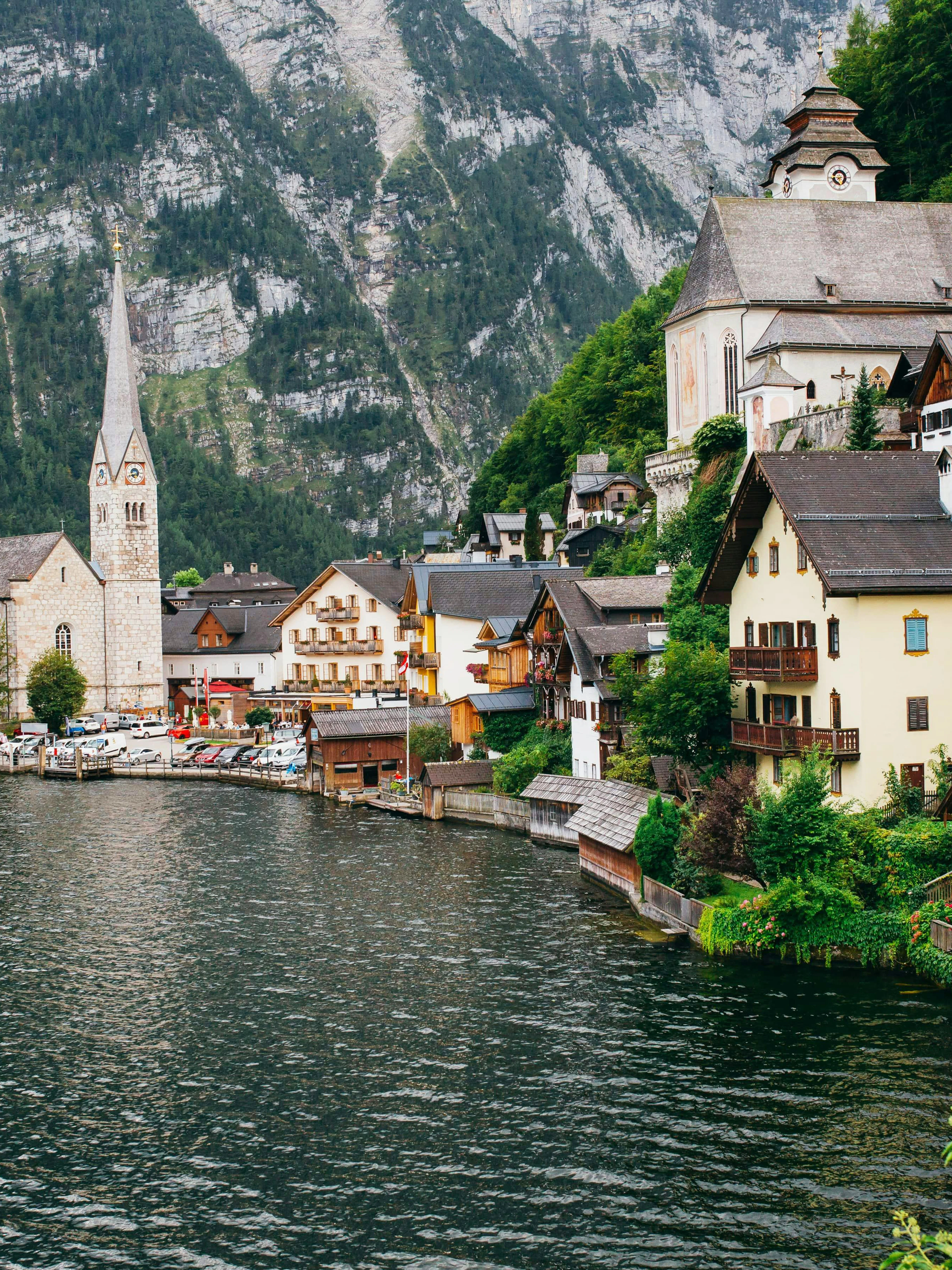 Village of Hallstatt along Lake Hallstatt with alpine backdrop, Salzkammergut, Austria.