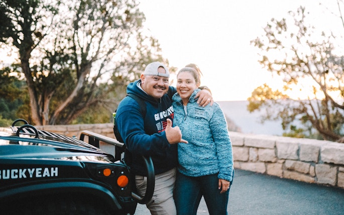 Guests enjoying the Grand Canyon National Park Hummer Tour at sunset.