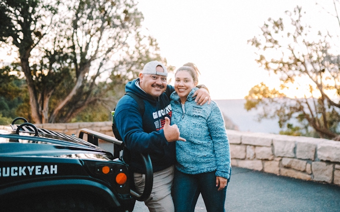 Guests enjoying the Grand Canyon National Park Hummer Tour at sunset.