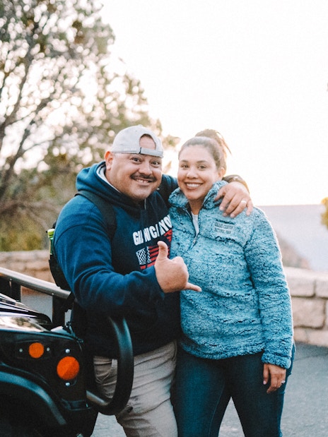 Guests enjoying the Grand Canyon National Park Hummer Tour at sunset.