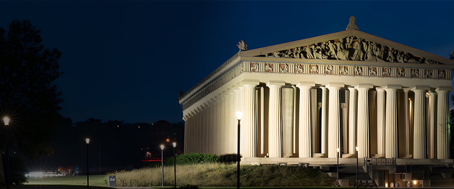 Parthenon replica illuminated at night in Nashville, United States.
