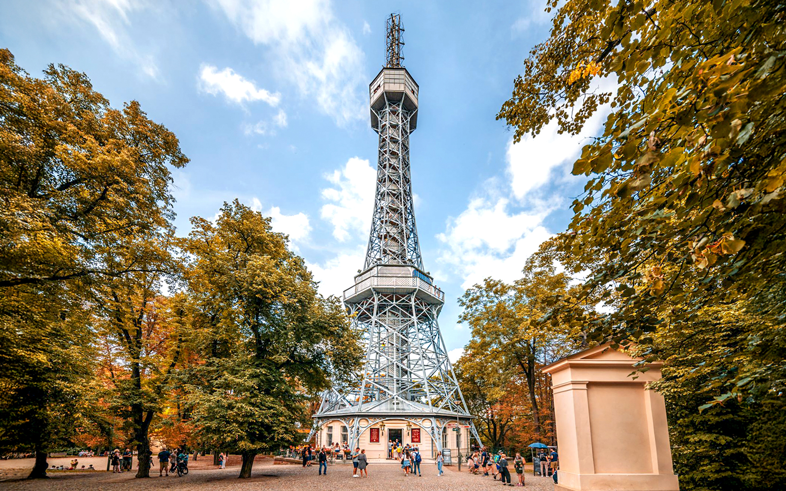 Petrin Tower exterior surrounded by trees in Prague, Czech Republic.