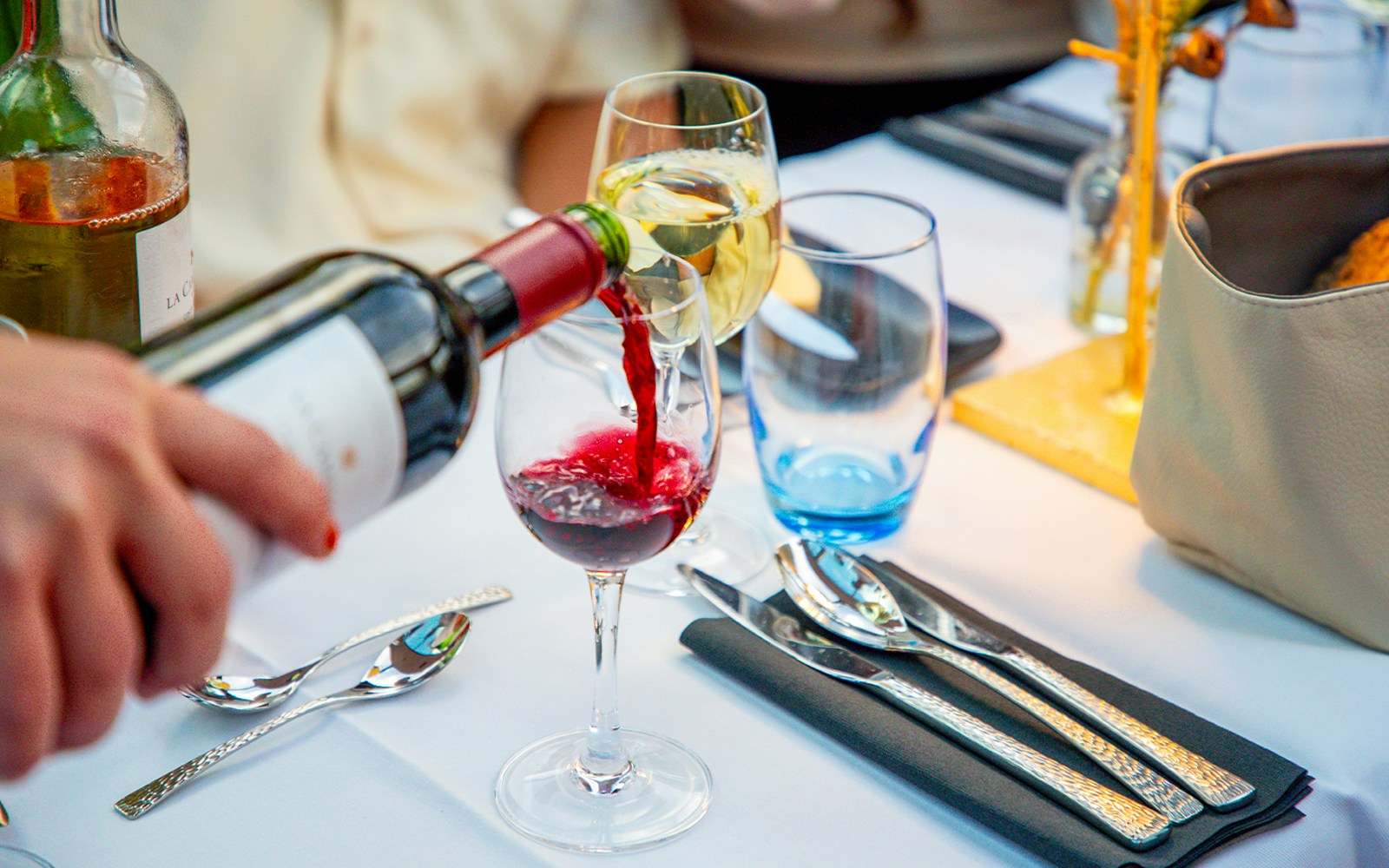 Candlelight cruise on Amsterdam canal with wine and Dutch cheese.