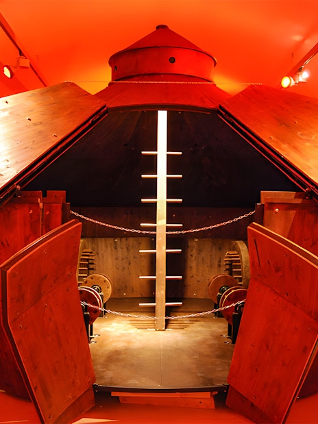 Leonardo da Vinci museum exhibit featuring a wooden armored vehicle model.