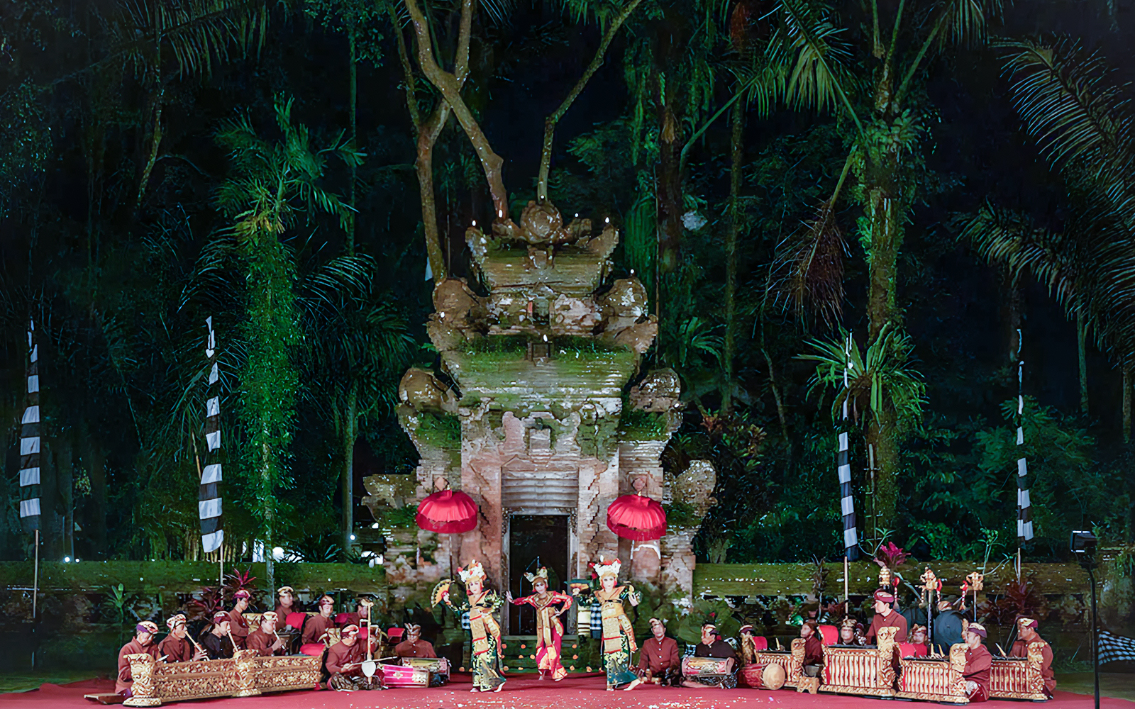 Legong dancers performing at Arma Museum Resort with traditional musicians in Bali.