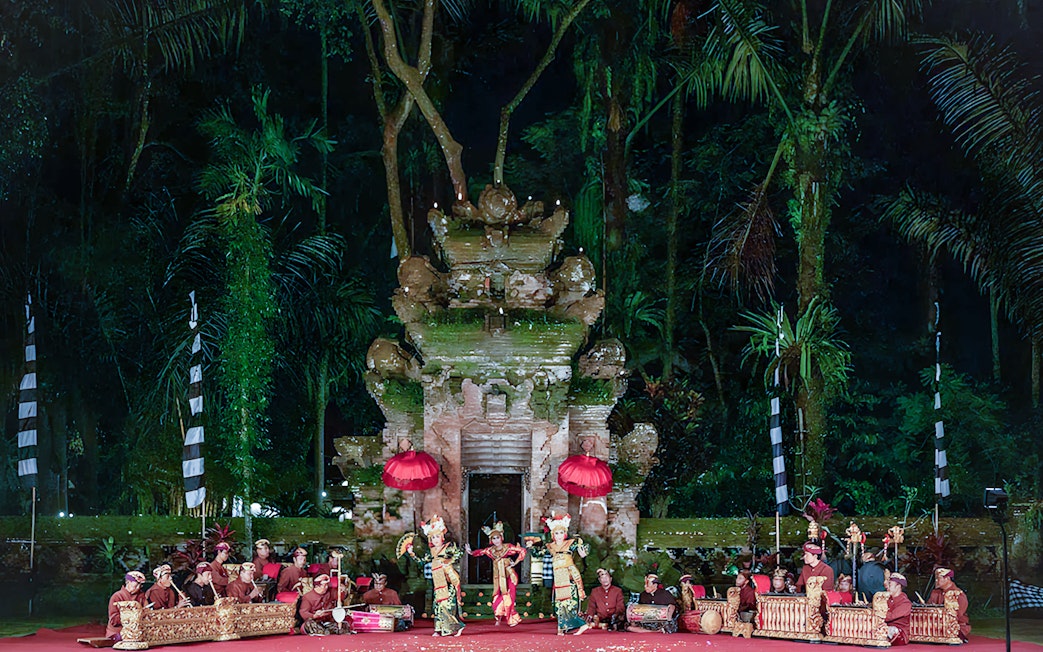 Legong dancers performing at Arma Museum Resort with traditional musicians in Bali.