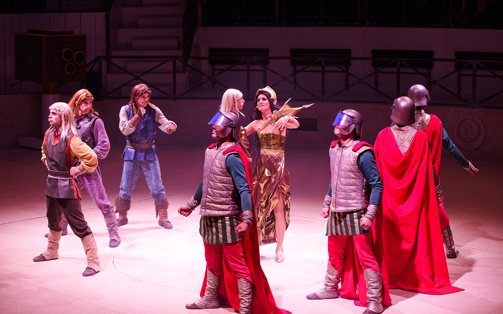 Actors in Roman costumes perform a scene at Parc Asterix.