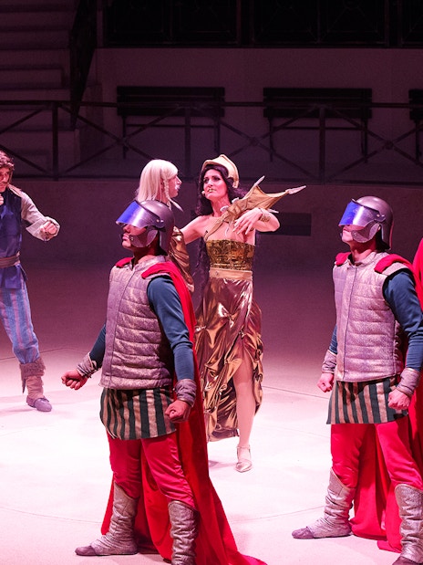 Actors in Roman costumes perform a scene at Parc Asterix.