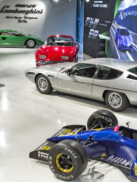 Classic and modern Lamborghini cars displayed at Ferruccio Lamborghini Museum, Bologna, Italy.