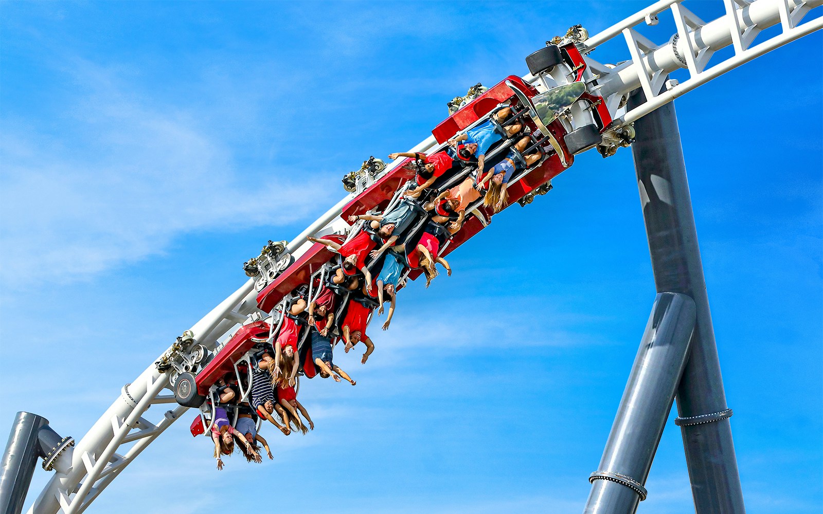 Riders upside down on Maxx Force roller coaster at Six Flags Great America.