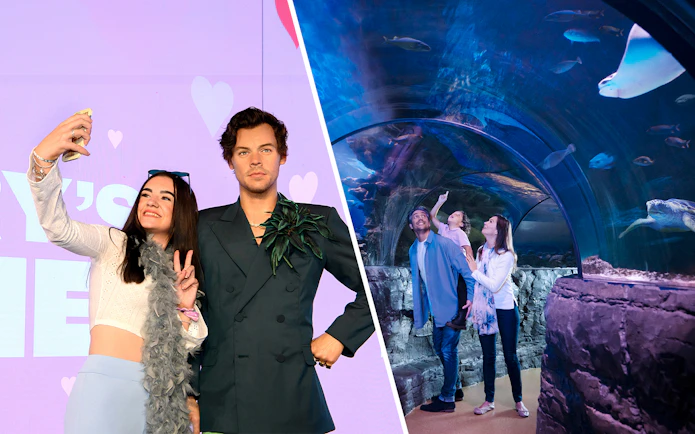 Madame Tussauds wax figure and family exploring SEA LIFE London Aquarium tunnel.