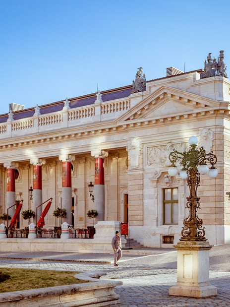 Hungarian Royal Guard and Riding Hall in Budapest with ornate architecture.