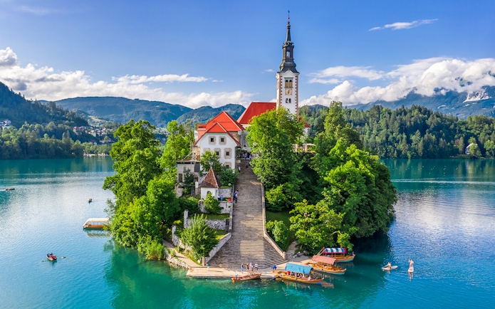 Aerial view of Pilgrimage Church of the Assumption of Maria on Lake Bled island, Slovenia.