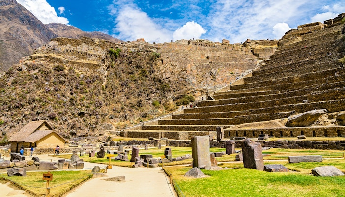 Terraced stone ruins at the Inca archaeological site in Ollantaytambo, Sacred Valley, Peru.