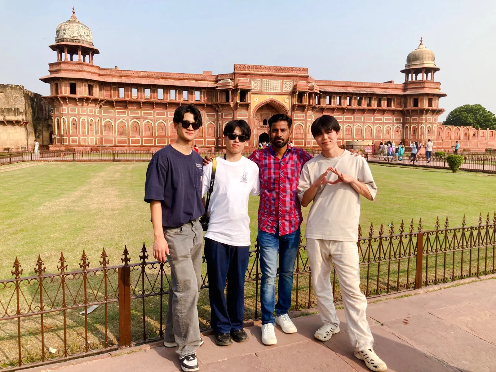 Tourists at Agra Fort during the Taj Mahal and Agra tour from Delhi.