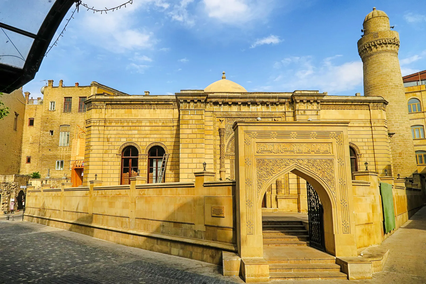 Historic building with intricate archway in Old Baku, Azerbaijan.